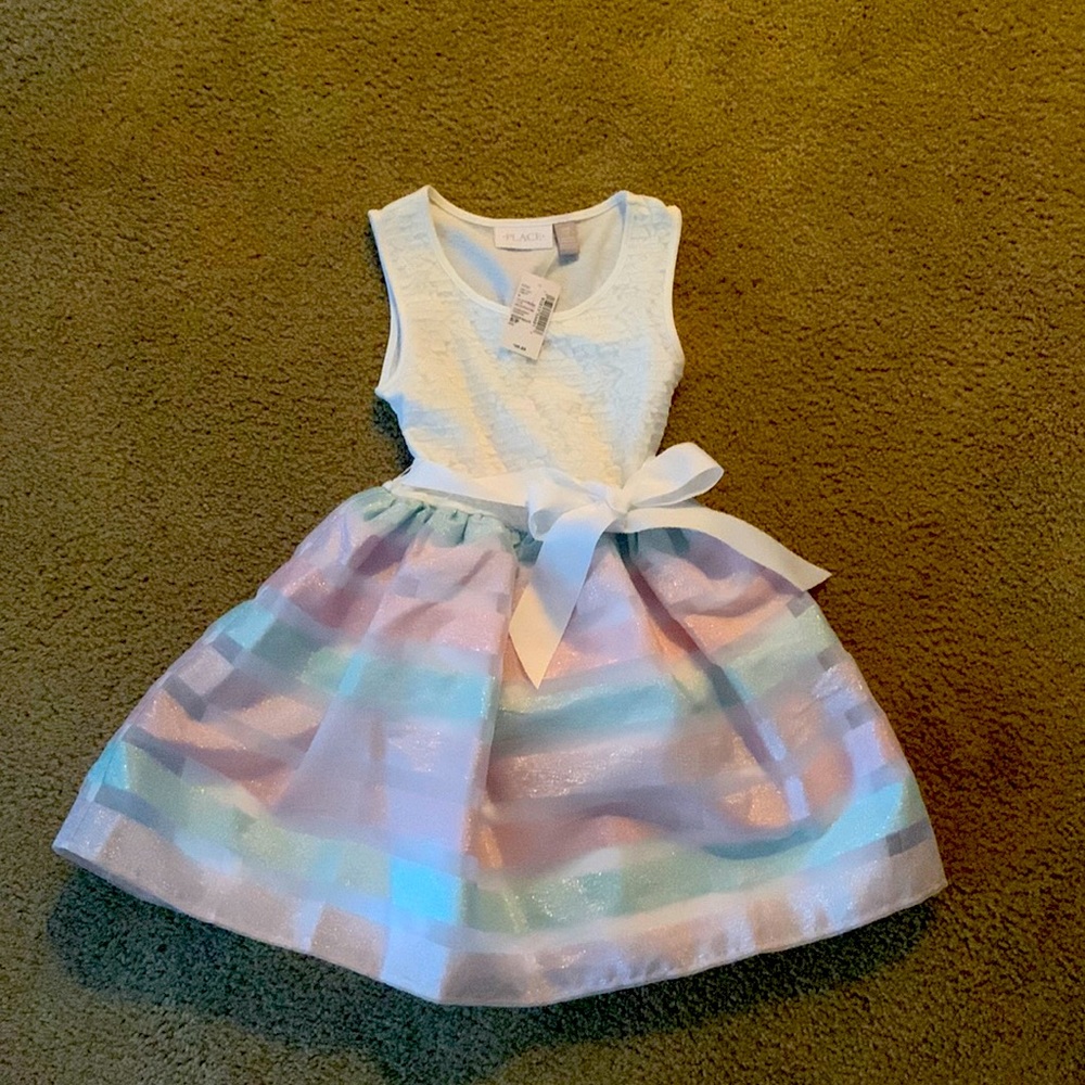 Size 5/6 satin lined and tulle ruffle dress.  Machine washable.